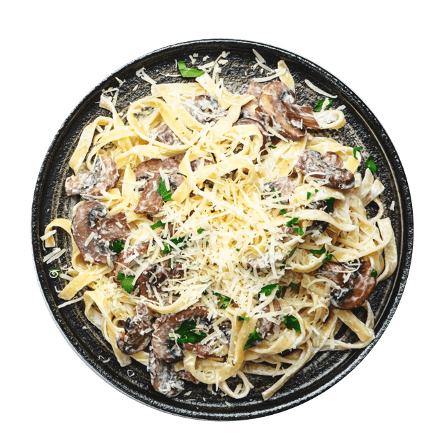 Tagliatelle pasta met champignons en Parmezaanse kaas